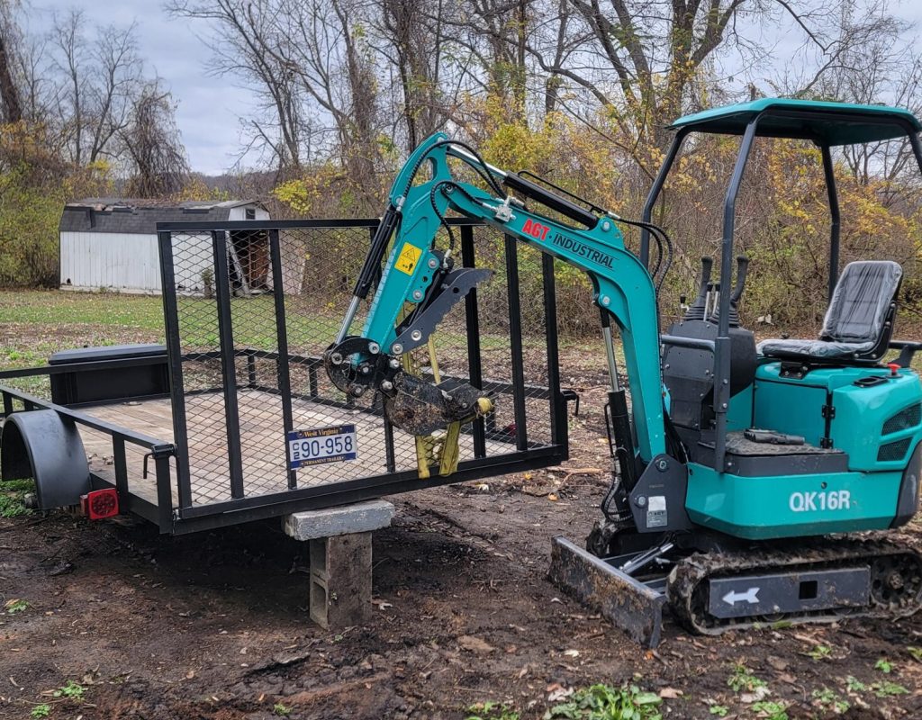 Professional excavator operating construction site in Fraziers Bottom, WV