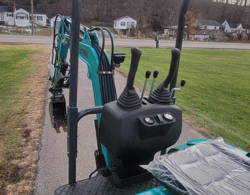 Excavation equipment in use on construction site in West Virginia