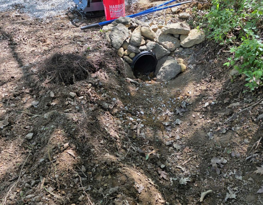 Excavator digging land in Ona, WV construction site