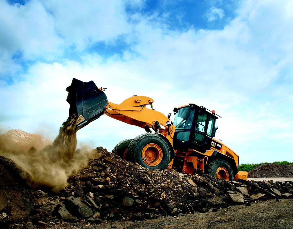 Dirt Shifters - Wheel Loader moving dirt.